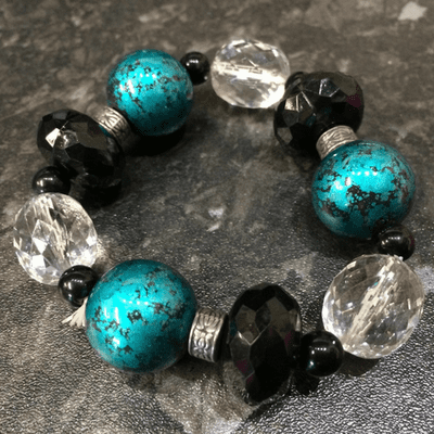 Black Blue and Clear Beaded Elasticated Bracelet and silver feature wraps
