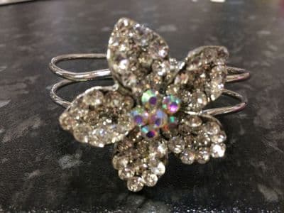Hinged Silver Colour Bangle with a large Crystal Flower Head