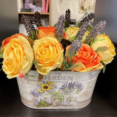 Orange & Yellow Roses In  A Metal Planter