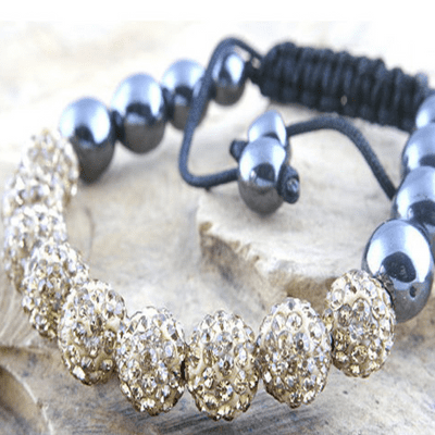 Shamballa Style Fashion Bracelet with nine facetted encrusted Gold Beads