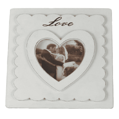 White wooden double photo frame with a heart window for photo