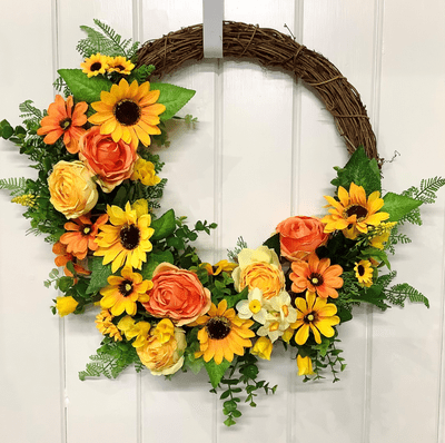 Yellow Sunflowers, Roses, Ranunclus and Anemone's Door Wreath with lovely Greenery