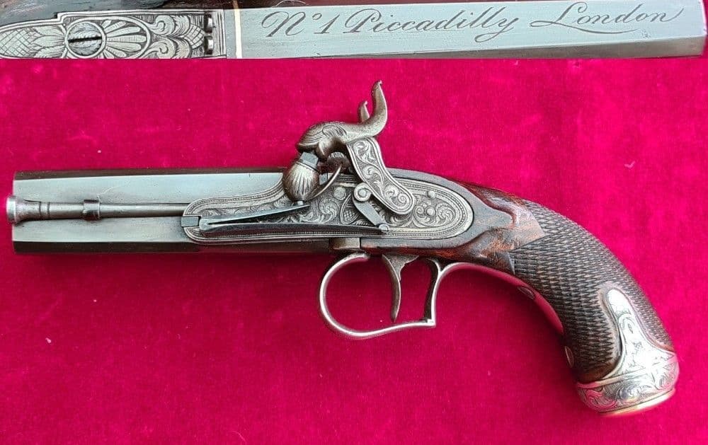 X X X SOLD X X X Cased English double barrelled percussion pistol by