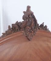 Antique French walnut bed frame