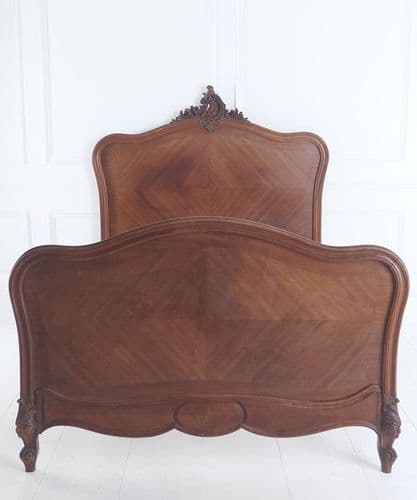 Antique French walnut bed frame