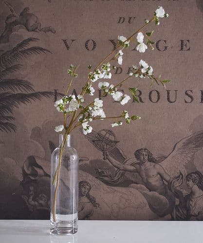 Faux white blossom stems in bottle - SOLD