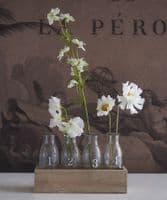 Numbered bottle vase set in wooden tray