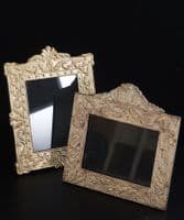 Pair of antiqued silver repoussé standing frames - SOLD