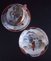 Pair of rare handpainted Japanese eggshell cups & saucers