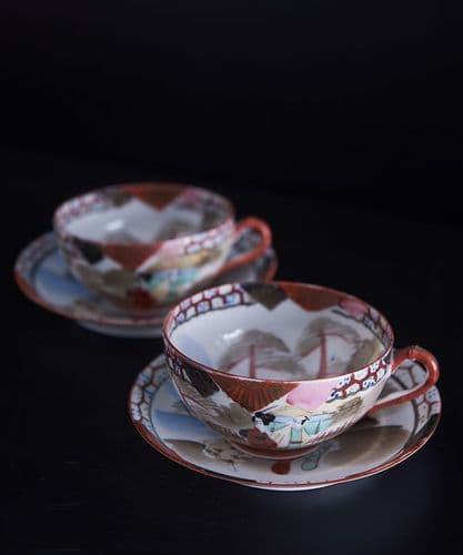 Pair of rare handpainted Japanese eggshell cups & saucers
