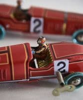 Pair of wind-up metal racing cars