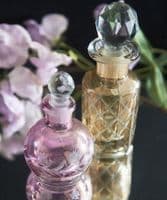 Set of two cut glass perfume bottles