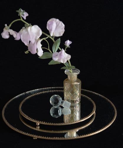 Set of two mirror and brass trim stands