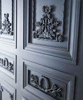 Three French carved panels - black