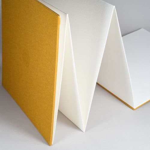 138119 USKbooks Watercolour Sketchbook, Mustard Linen Cover, Concertina 20cm x 20cm