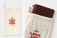 **TRAVELER'S COMPANY - LOVE & TRIP - RED NOTEBOOK (PASSPORT)