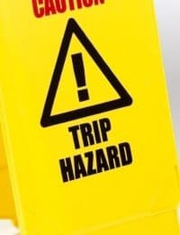 'Caution Trip Hazard' warning A-frame sign