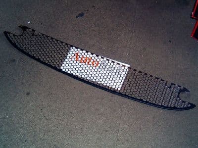 Front intake grille with tow eye cut outs, polished s/s, Mazda MX-5 mk1