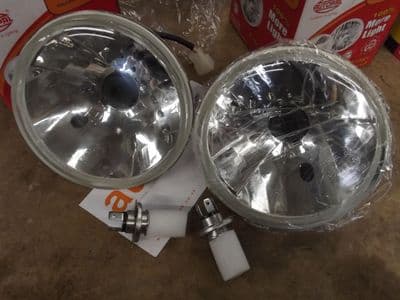 Headlamp units (pair), 7'' halogen, Clear lens type, with bulbs