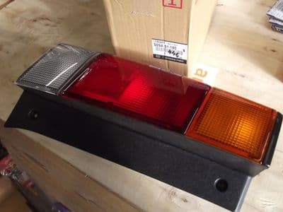 Light unit, rear l/h, Mazda Bongo 1995-97, orange indicator, S09A51180
