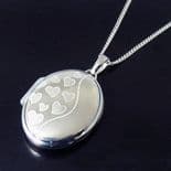 Silver Oval Locket with Hearts pattern, personalised engraved ref. SOHPL