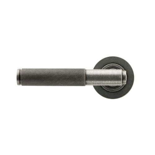 From the Anvil Brompton Door Handle on Plain Rose - Pair - Pewter Patina - 45679