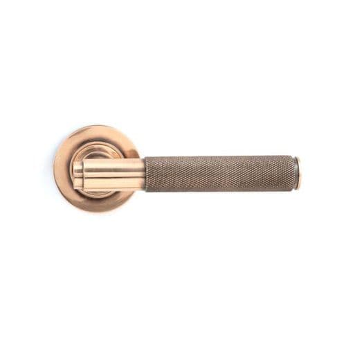 From the Anvil Brompton Door Handle on Plain Rose - Pair - Polished Bronze - 46101