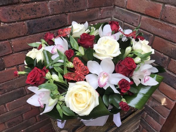Elegant Orchid and Roses arrangement