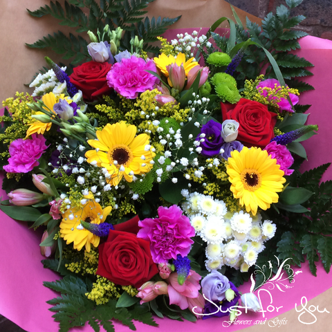Exclusive Florist Choice Hand tied arrangement available in bright colours