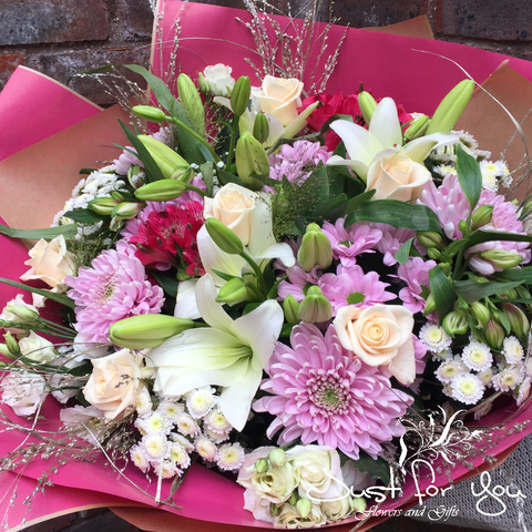 Exclusive Florist Choice Hand tied arrangement available in pastel colours
