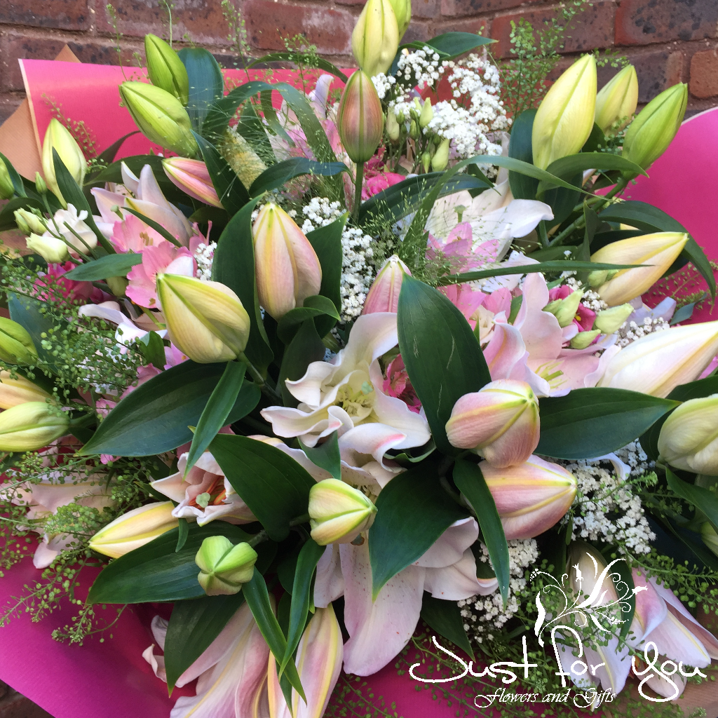 Exclusive White & Pink Oriental Lilies Hand tied arrangement