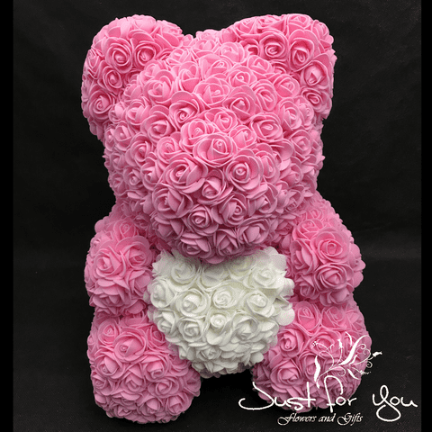 Medium pink teddy with white heart in Presentation box