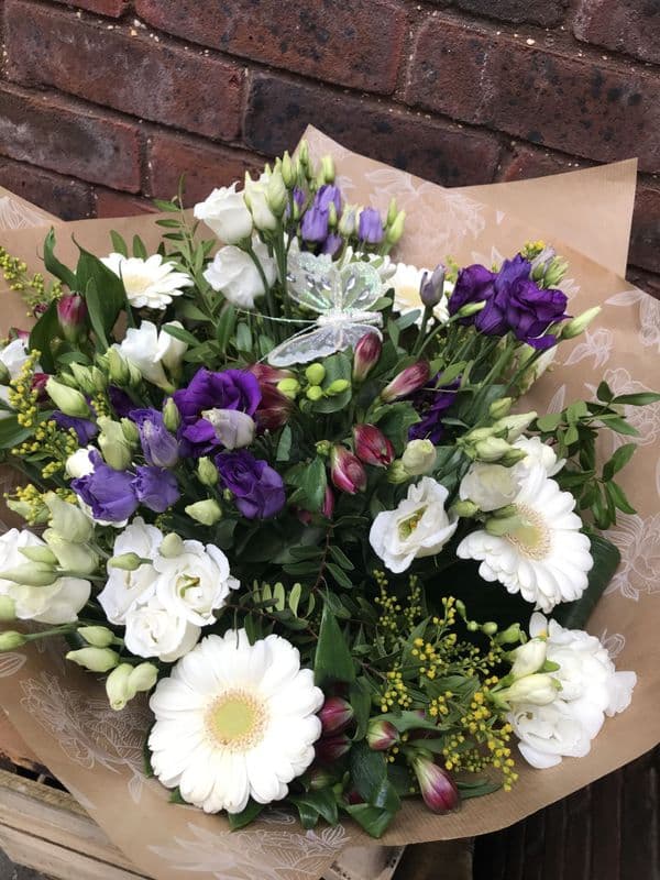 Pastel colour with butterfly hand tied bouquet