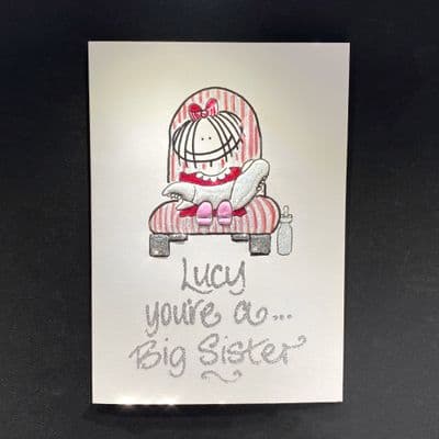 Big Sister Holding Baby