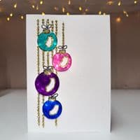 Four Hanging Baubles Christmas Card