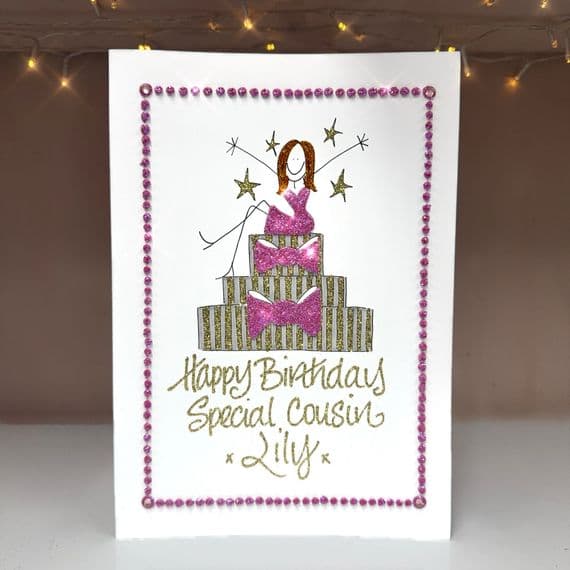 Girl Sitting on Cake with Bows