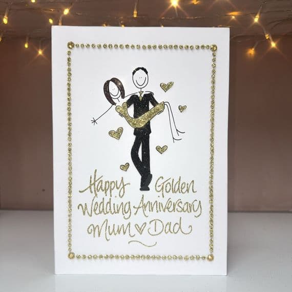 Man Holding Woman Anniversary or Engagment Card