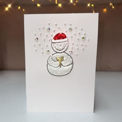 Snowman Holding Heart Christmas Card