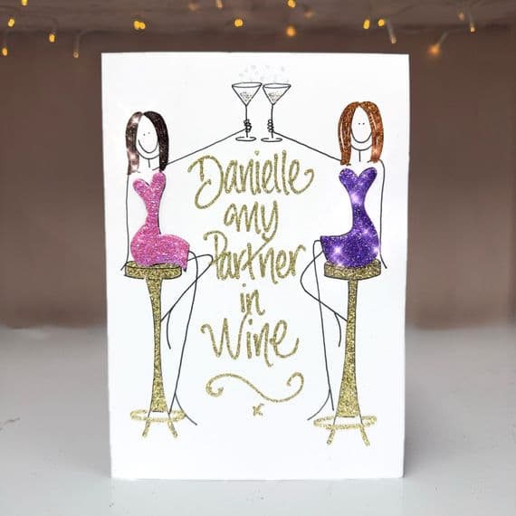 Two Girls on Bar Stools