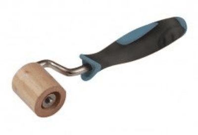 Wooden seam roller