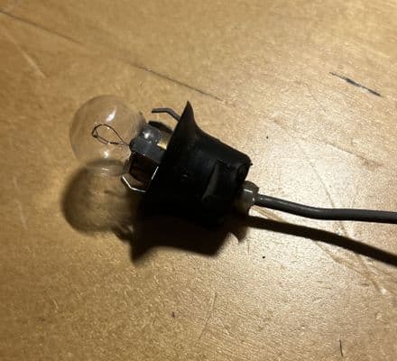 1953-70 Chevy plastic SOCKET dash bulb with GE 1895 single pole bayonet bulb inc pigtail used