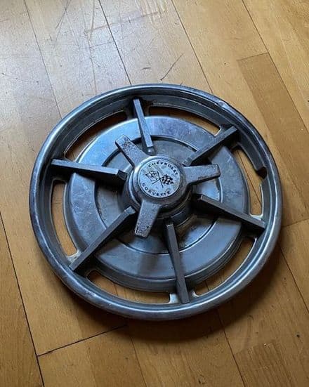 1963 Hubcap , OK used . Chrome poor on the easily replaced spinner
