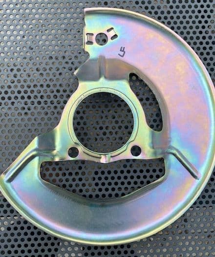 1976-1982 LH Front Brake Splash SHIELD GM 3953423 , New. Gold Passivate . Fits 1965-1975
