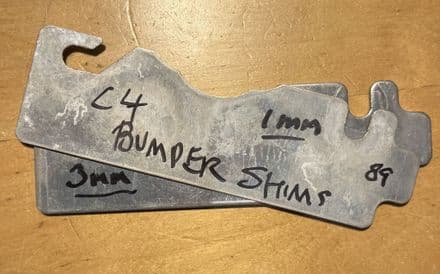 1984-1996 PAIR C4, GM14086663 & GM14086664 front bumper IMPACT BAR SHIMS 1x.8mm & 1x3mm. used