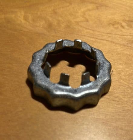 1984-96. C4 Corvette, rear driveshaft wheel spindle nut RETAINER GM 562248 Used