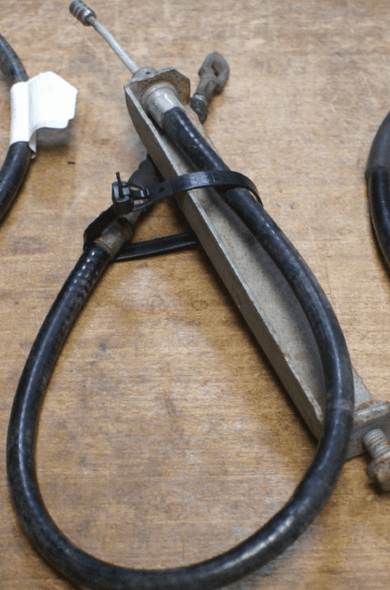 1989-96 Parking Brake Cable W/Bracket,Rear,OEM,Used