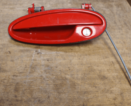 1997-04 C5 Drivers Side Exterior Door Handle,Red,GM 10244584,Used