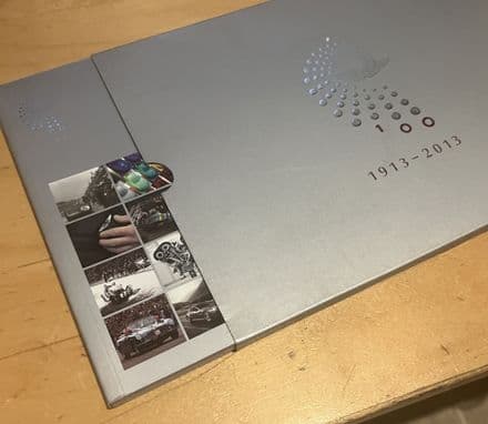 2013 ASTON MARTIN pn 705790 colour 92-page Anniversary brochure in slip-case, like new