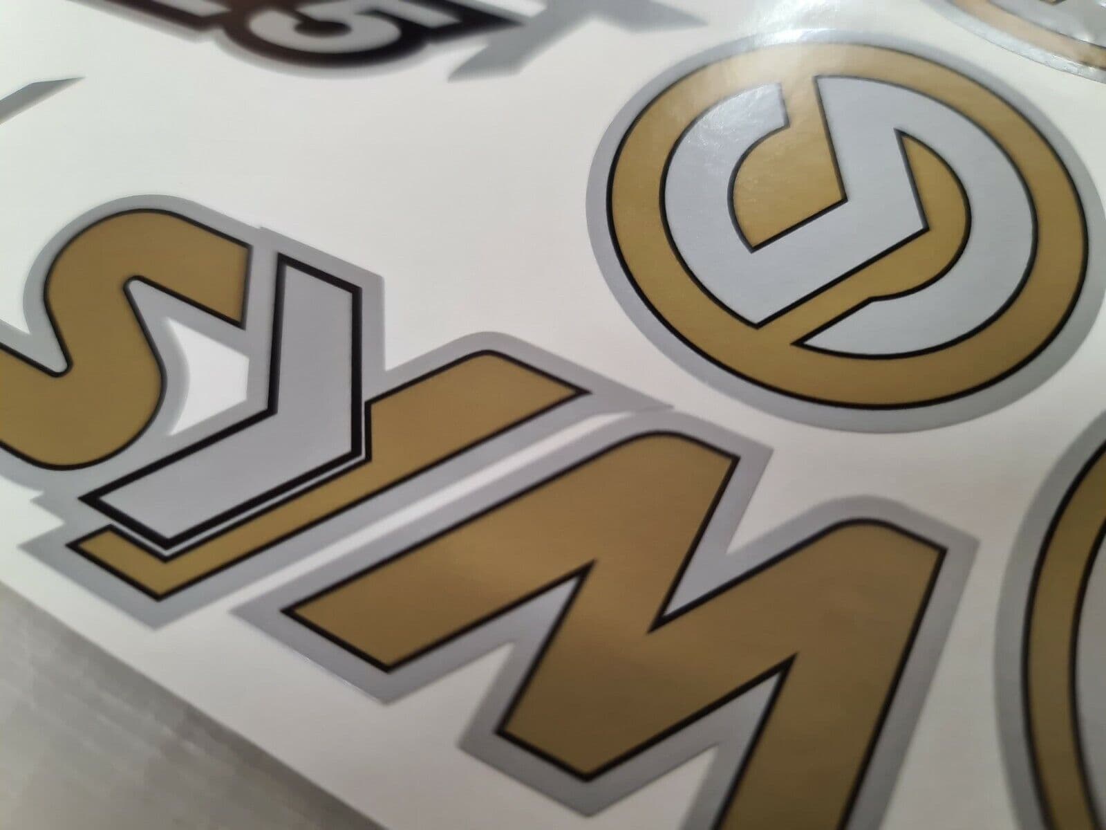 Sym Jet 4 125 Decals/Stickers Decals/Stickers Gold Silver Black