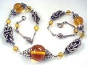 1930's Art Deco Necklace with Elaborate  Chromed Chain Work and Amber Glass Marble Beads (SOLD)